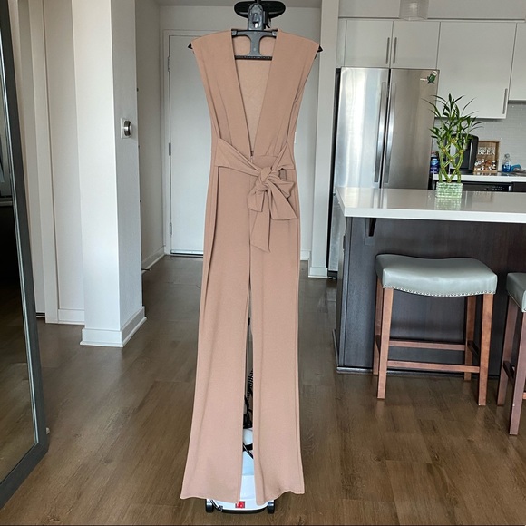 ANGL Pants - Nude deep-v jumpsuit with bow tie (front or back)